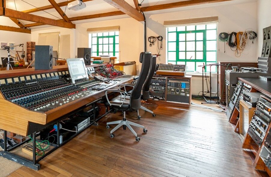 The live room at Kensaltown Studios, with a mixing desk, monitors and instruments